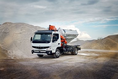 FUSO Canter (7.49 t) with a three-way tipper from Meiller and a crane from Atlas, a comfort single cab