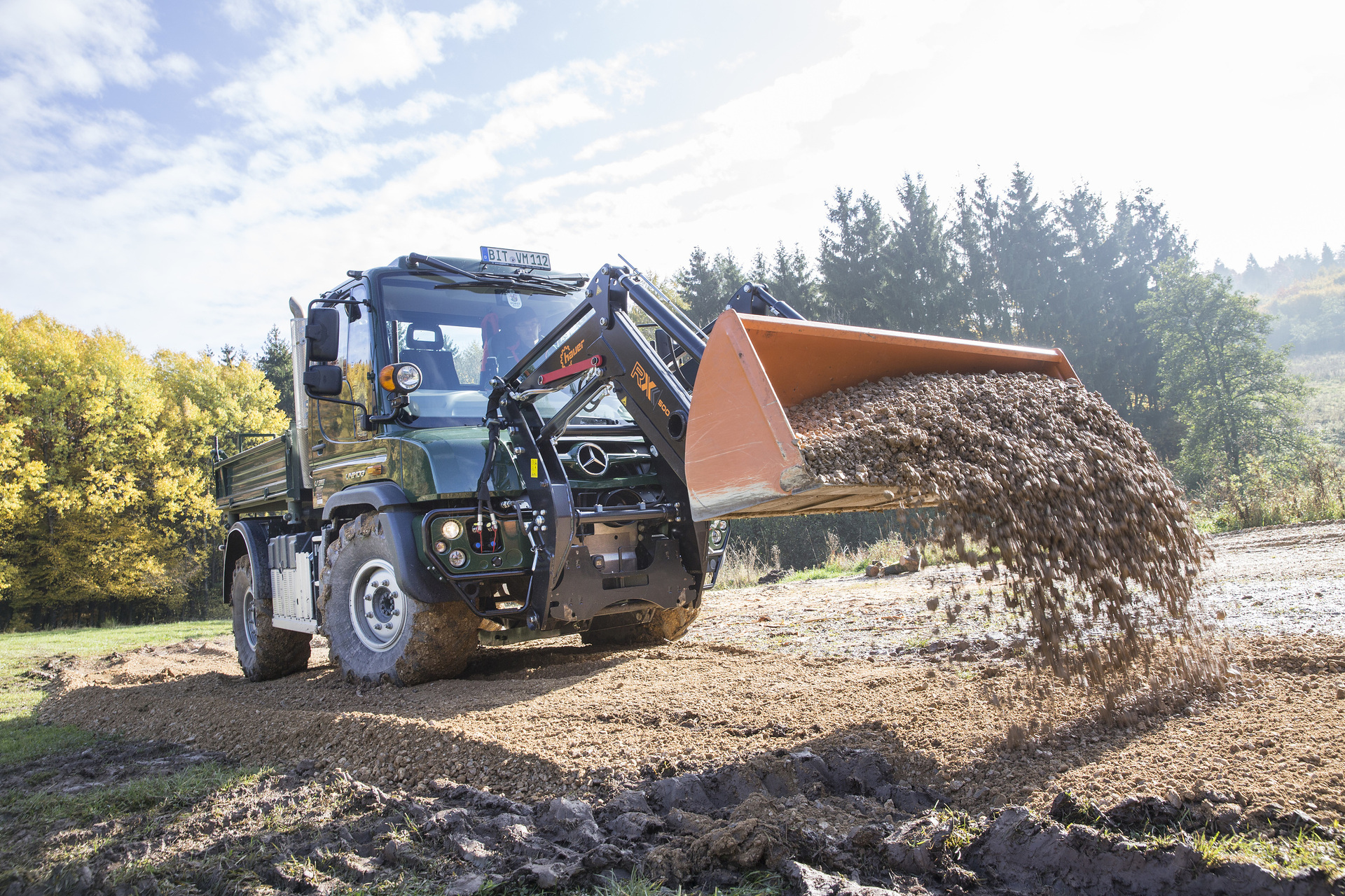 Unimog implement carrier with front loader The Unimog for modern agriculture: three implement carriers at Agritechnica